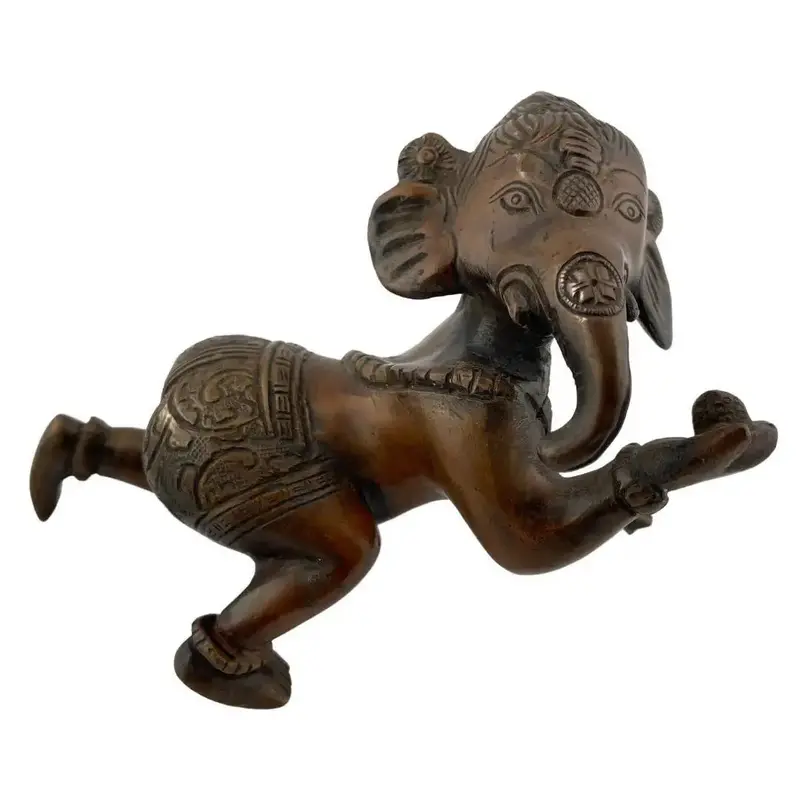 Youthful Ganesha Sculpture – Crawling Form Celebrating Wisdom And Prosperity 1